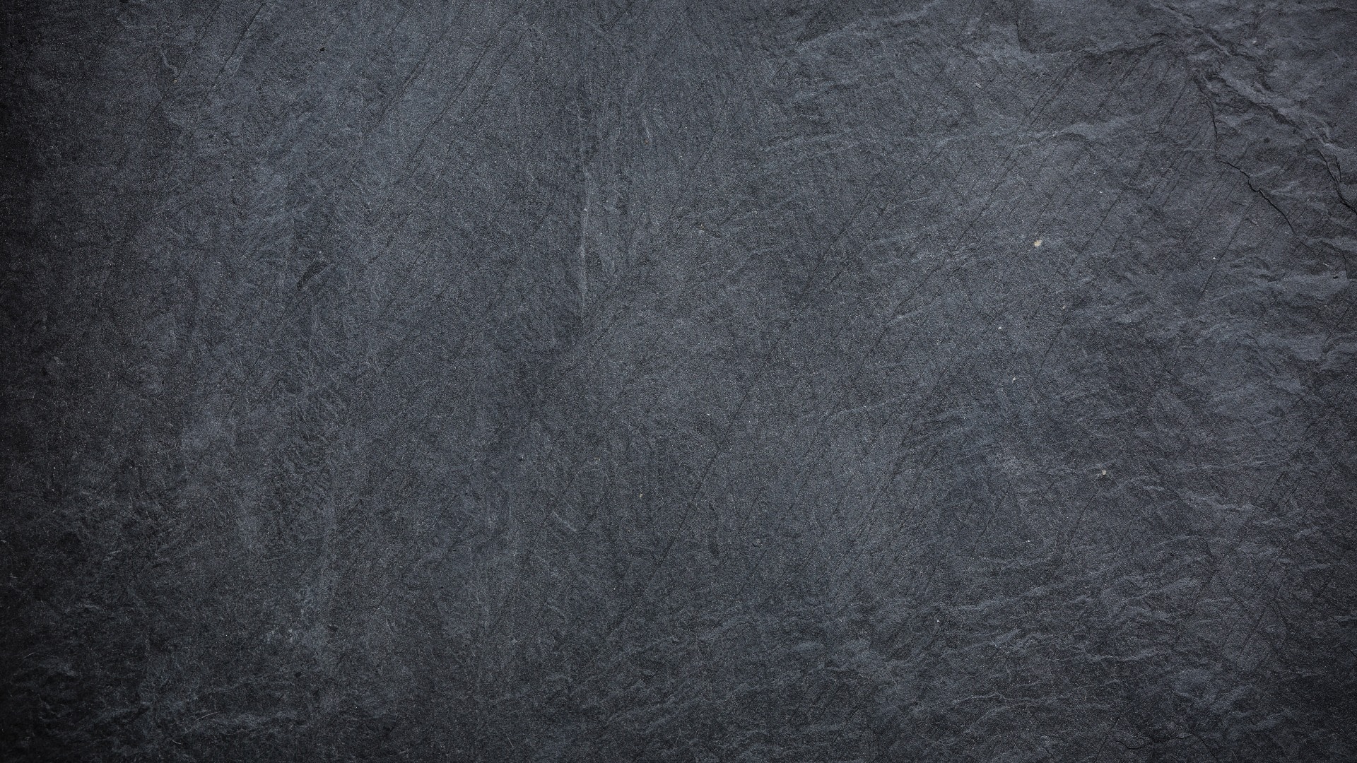 texture of Dark grey and black slate background.